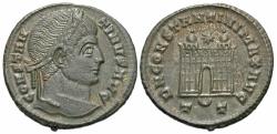Ancient Coins - Constantine I. A.D. 307/10-337. ’ follis. Ticinum, A.D. 326. Near EF, brown patina, a hint of light porosity. Rare.