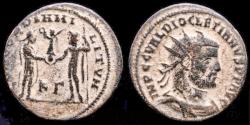 Ancient Coins - Diocletian AE antoninianus emperor receiving Victory on globe from Jupiter