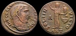Ancient Coins - Maximinus II Daia AE follis Sol standing left