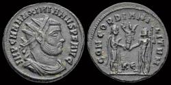 Ancient Coins - Maximianus Herculius AE radiate Jupiter presents Victory on globe