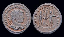 Ancient Coins - Maximianus Herculius AE radiate emperor receiving Victory on globe
