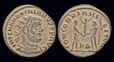 Ancient Coins - Maximianus Herculius AE radiate Jupiter presents Victory on a globe