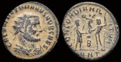 Ancient Coins - Maximianus Herculius AE radiatus Jupiter presents Victory on globe to emperor