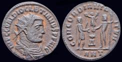 Ancient Coins - Diocletian AE radiate emperor  standing right