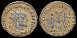 Ancient Coins - Diocletian AE radiatus empror receiving Victory on a globe from Jupiter