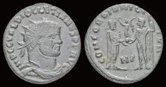 Ancient Coins - Diocletian AE radiatus emperor receiving Victory on globe from Jupiter