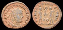 Ancient Coins - Maximianus Herculius AE radiate Jupiter presents Victory on a globe
