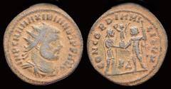 Ancient Coins - Maximianus Herculius AE radiate Jupiter presents Victory on a globe