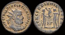 Ancient Coins - Diocletian AE radiatus  Jupiter presents Victory on a globe to emperor