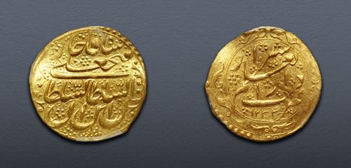 World Coins - IRAN, Qajars. Fath 'Ali Shah. As Shah, AH 1212-1250 / AD 1797-1834. AV Toman (24mm, 10h).