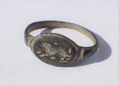 Ancient Coins - Ancient Roman bronze Ring. 15 mm.  Incuse Lion. Intact.