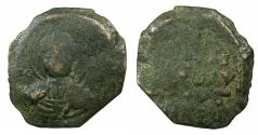 World Coins - CRUSADER STATES.Principality of ANTIOCH.Tancred AD 1104-1112.AE.Follis.1st type, large flan. Facing bust of Saint Peter.