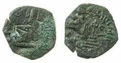 World Coins - ISLAMIC.The Caliphate of Abd Al-Malik 65-86H (AD 685-705).Fals.Mint unclear. Over strike on Byzantine issue Constans II