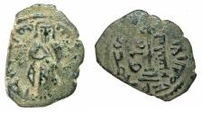 World Coins - UMAYYAD CALIPHS.Abd al-Malik 65-86H ( AD 685-705).AE.Fals.Mint of QINNARSRIN.