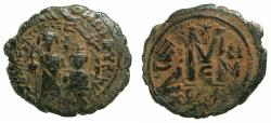 Ancient Coins - BYZANTINE EMPIRE.Heraclius AD 610-641.AE.Follis.struck AD 612/ 613. Mint of CONSTANTINOPLE. Overtrike on Maurice Tiberius.