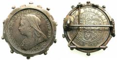 World Coins - UNITED KINGDOM. One Schilling.1897. Mounted in a silver broach hallmarked Birmingham 1889 made by Edward Durban & Co.