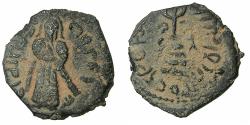 World Coins - ISLAMIC.The Caliphate of Abd Al-Malik 65-86H (AD 685-705).Fals.Mint of Sarmin. Standing Caliph.