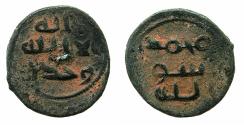 World Coins - UMAYYAD.Anonymous.Circa 78-85H ( AD 698-705 ).AE.Fals.Non mint or date. ( possibly struck at al-Kufa or al-Basra ).