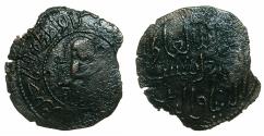 World Coins - DANISHMENDIDS of Sivas. Shams al-Din Ismail 599-567H ( AD 1164-1172 ).AE.Dirhem.No mint or date. Enthroned figure.