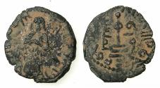 World Coins - ISLAMIC.The Caliphate of Abd Al-Malik 65-86H (AD 685-705).Fals.Mint of Qinnasrin. Standing Caliph.