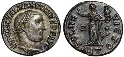 Ancient Coins - Maximinus II Silvered Follis "Sol, Holding Head of Serapis" Good Very Fine