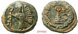World Coins - 356HC6Z) RARE MINT Pre-reform issues, Arab-Byzantine. Standing Caliph coinage. AE Fals (22 mm, 3.69 g, 12h). Al-Ruha mint. Undated. Without name of caliph. Obv. Standing caliph