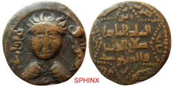World Coins - 102EE4Z) ARTUQIDS of MARDIN, Husam al-Din Yuluq Arslan. (AH 580-597/1184-1201 AD). AE Drachm (11.54 gm; 31 mm). Obverse, facing forward figure with diademed, king's name on the rig