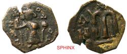 World Coins - 357HC6Z) Arab-Byzantine coinage. Circa 650s-660s. AE Fals (19 mm, 1.96 g). Imperial figure standing facing, holding long cross and globus cruciger; c/m: Greek cross / Large m; star