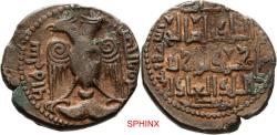 World Coins - 379CCC6X) Artuqids of Kayfa & Amid. Nasir al-Din Mahmud. AH 597-619 / AD 1201-1222. Æ Dirham (29.2mm, 13.64 g, 11h). Al-Hisn mint. Dated AH 610 (AD 1213/4) in numerals. Double-head
