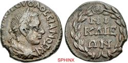 Ancient Coins - 262MH5X) BITHYNIA, Nicaea. Volusian. AD 25 As Caesar, AD 2511-253. Æ Triassarion (19mm, 4.28 g, 12h). Laureate, draped, and cuirassed bust right / NI KAIE ΩN in three lines within