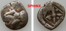 Ancient Coins - 976RF17) ASIA MINOR, 4TH-3RD Cent.BC, AR FRACTION, 0.38 Grms, 7 MM, Lion's head left / Incuse square with 4-pointed star; Fine.