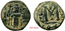 World Coins - 329HC6Z) ISLAMIC, Pre-reform issues. Arab-Byzantine. Imperial image coinage. AE Fals (19 mm, 4.00 g). Type VI. Dimashq (Damascus) mint. Struck circa 660s-680. Standing imperial fig