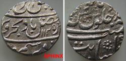World Coins - 135FC5) INDIA, Mughal Kings. Farrukhsiyar ibn Azim al-Shan. 1713-1719. AR Rupee (23 mm, 11.44 gm). Khanbayat mint. Dated AH 1125, regnal year out of flan. Titles of Farrukhsiyar wi
