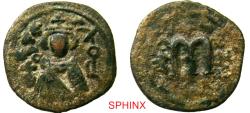 World Coins - 346HC6Z) Arab-Byzantine; Umayyad Caliphate. temp. 'Abd al-Malik ibn Marwan. AH 65-86 / AD 685-705. AE Fals. 4.36 grms, 22 mm; Imperial bust type (Type VII). Hims (Emesa) mint. Stru
