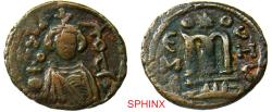 World Coins - 454RM5Z) ARAB-BYZANTINE. Temp Mu'awiya Ibn Abi Sufyan first Umayyad Caliph; Ummayad Imperial Image. Circa 670-690 AD. AE Fals (20 mm, 4.05 gm). Hims (Emisa) mint. Crowned bust of