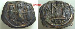 World Coins - 62FF8) Arab-Byzantine, Pseudo-Byzantine coinage, Type B, without mint, circa 650s-680s, AE fals, large module, 23 X 20 mm, 4.05 grms, Obv. three standing figures holding long cross