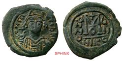 Ancient Coins - 58FG6Z) Maurice Tiberius. 582-602. AE Follis (30.5 mm, 10.65 g). Nicomedia mint, 1st officina. Dated RY 7 (589/90). Helmeted and cuirassed bust facing, holding globus cruciger and