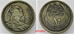 World Coins - 521CM22) EGYPT, REPUBLIC, 10 Piasters, 7 grms, 0.625 silver, the SPHINX, dually dated 1376 AH and 1957 AD; KM 382, VF+ cond.  NOTE : The two marks on the sphinx's face are NOT scra