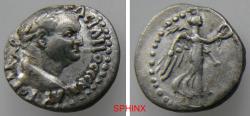 Ancient Coins - 122EH6Z) CAPPADOCIA, Caesarea-Eusebia. Vespasian. AD 69-79. AR Hemidrachm (14 mm, 1.72 g, 12h). Laureate head right / Nike advancing right, holding wreath and palm frond. VF