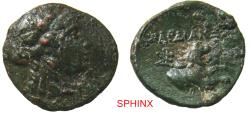 Ancient Coins - 568RG4X) LYDIA, Sardes. Circa 133 BC-AD 14. AE 17 mm, 3.49 g. Wreathed head of Dionysos right / Forepart of lion right; monogram to left. SNG Copenhagen 468; BMC 47; Fine
