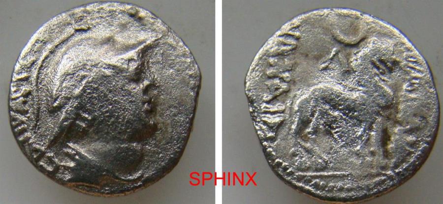 Ancient Coins - 252EH21X) YUEH CHI: Sapadbizes, ca. 20-1 BC, AR drachm (16 mm, 1.24 g), Mitch-2824/28, helmeted bust right, floral design on the helmet, name behind (effaced) // lion right, citing