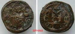 World Coins - 782CG3Z) Umayyad Caliphate. Uncertain period (pre-reform). ARAB-BYZANTINE TYPE; AH 41-77 / AD 661-697. AE Fals (19 mm, 3.47 g).  imitating Constans II. Dimishḳ (Damascus) mint FINE