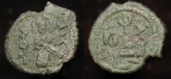World Coins - Arab Byzantine. Harran. Standing Caliph. Muhammad on left, Harran on right / Globe topped staff. Album 3537