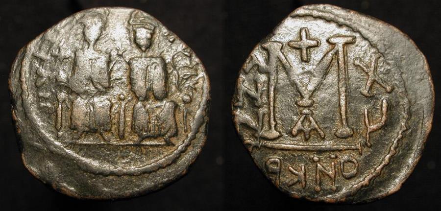 World Coins - Arab Byzantine. "Justin and Sophia" type. Late 7th century AE follis.
