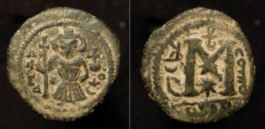 World Coins - Arab Byzantine. Pseudo-Damascus. Standing figure wearing short flared Tunic. Foss : 36, 37