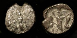 Ancient Coins - Samaria. 5th-4th Century BC. AR Obol. King holds Lions by Hind Legs.  M&Q SC 130-133.