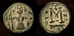World Coins - Arab Byzantine. Pseudo-Damascus. Standing figure wearing short Tunic with Falcon. Album 3527
