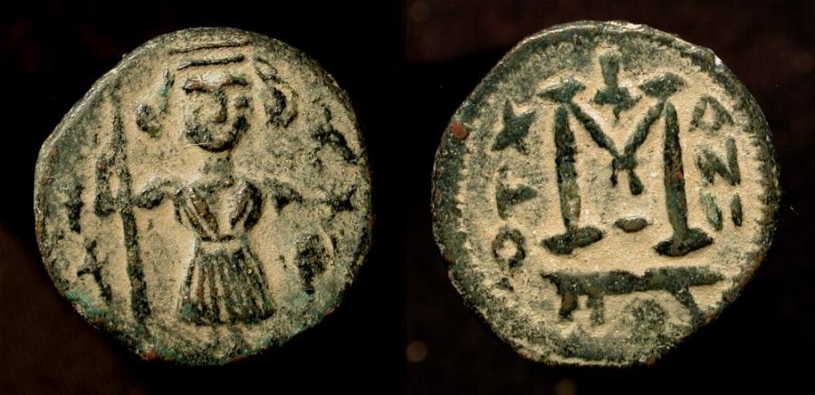 World Coins - Arab Byzantine. Pseudo-Damascus. Standing figure wearing short Tunic with Falcon. Album 3527