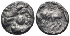 Ancient Coins - Eastern Celts. Skordoski in Syrmia. Circa 3rd-2nd century BC. AR Drachm (2.00g, 14mm). Imitating Philip II of Macedon, "Kugelwange" type. Dembski 1110