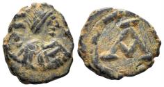 Ancient Coins - Justinian I. 527-565. AE Nummus (1.00g, 11mm). Carthage mint. Struck 534-9. SB 281
